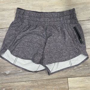 Heather grey size 4 Lululemon running shorts.